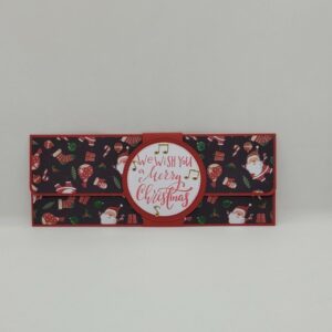 Pochette cadeau rouge Père Noël en musique